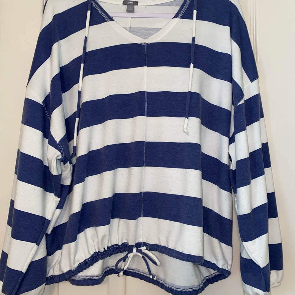 Long sleeve flowy and airy top, super soft material.